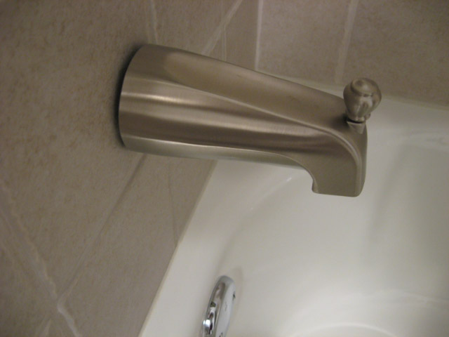 ub spout not flush with wall